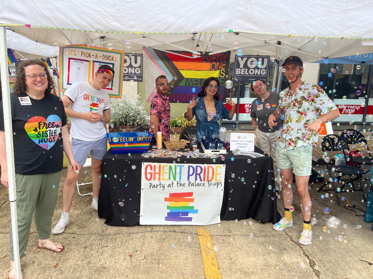 Ghent Pride bubbles and booth with young adults