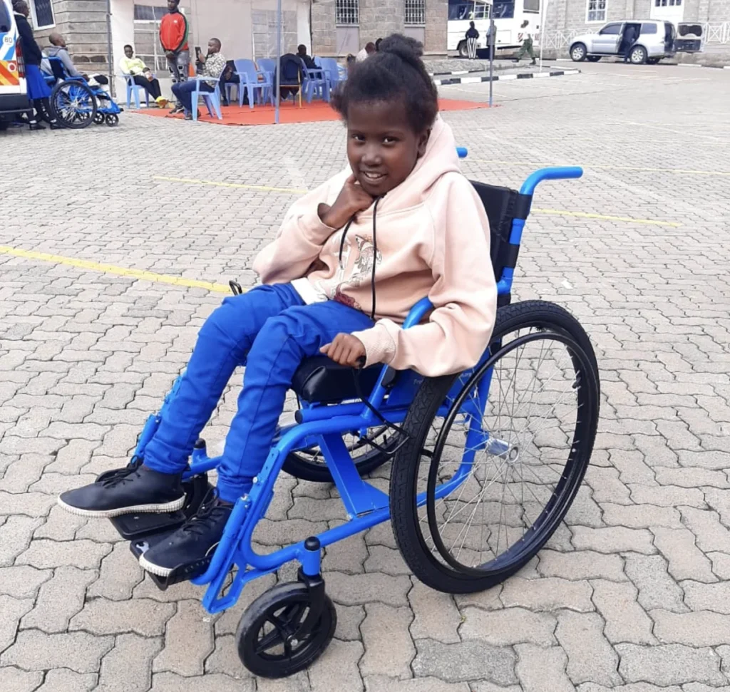 Caroline in a wheelchair