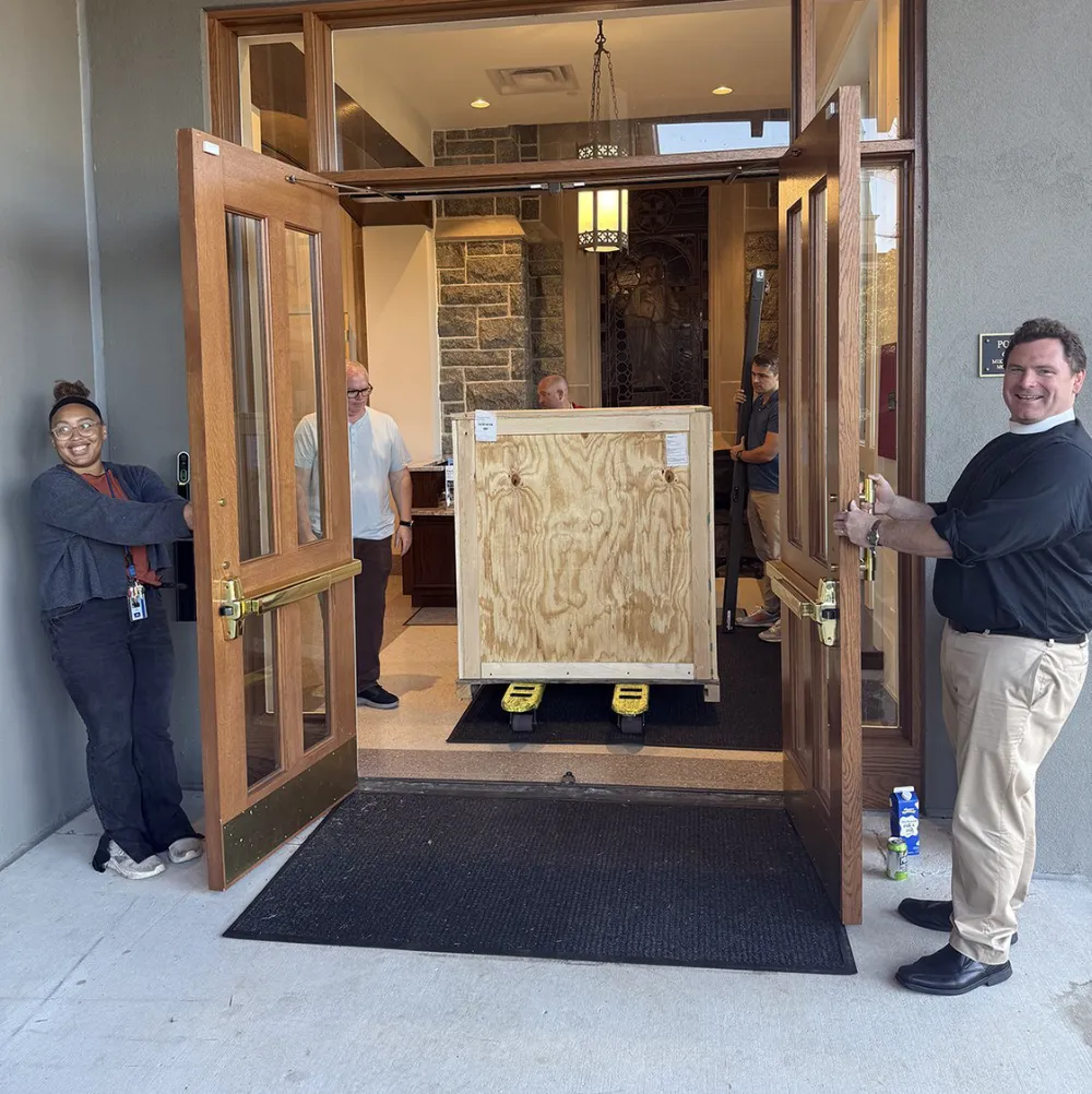 Receiving the saint john's bible in a large crate